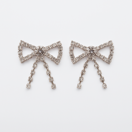 Schmuck für Schnürsenkel, silberne Schleifen mit Strass.