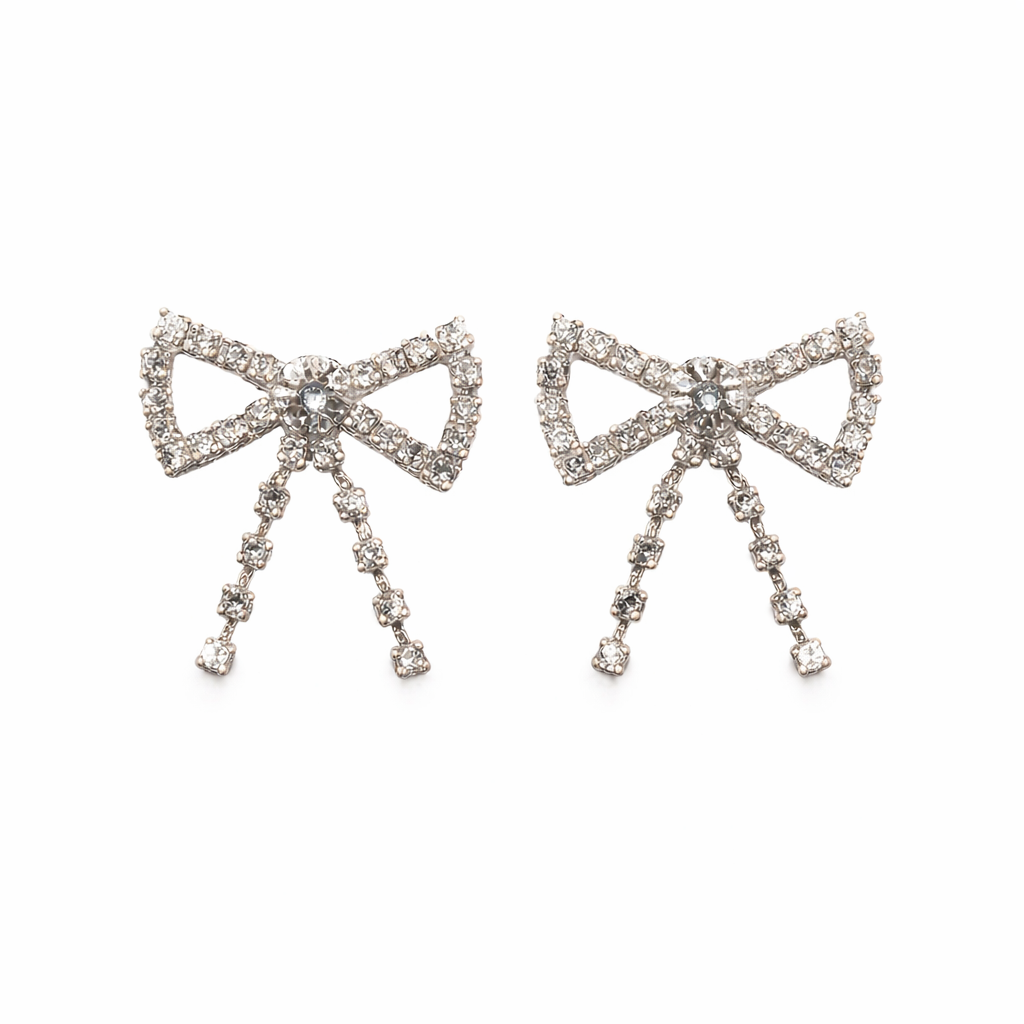 Silver bow with sparkling rhinestones for your shoelaces.