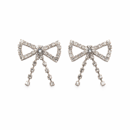 Silver bow with sparkling rhinestones for your shoelaces.